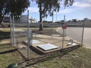 Galvanized Chain mesh enclosure with gates Chain mesh fencing with 3 barb wire on top.jpeg