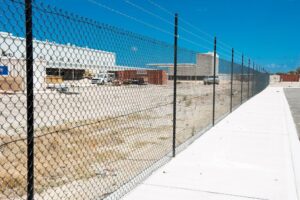 PVC black Railless Chain mesh fencing with 3 x rows of barbed wire